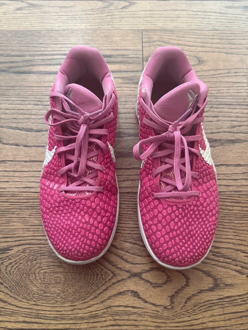 Nike Pink Low-Top Basketball Sneakers with White Swoosh
